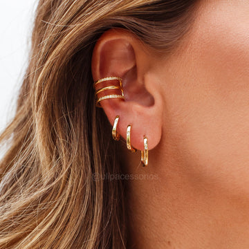 Piercing triplo liso e cravejado dourado